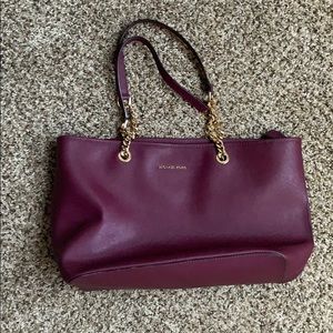 Micheal kors maroon and gold purse